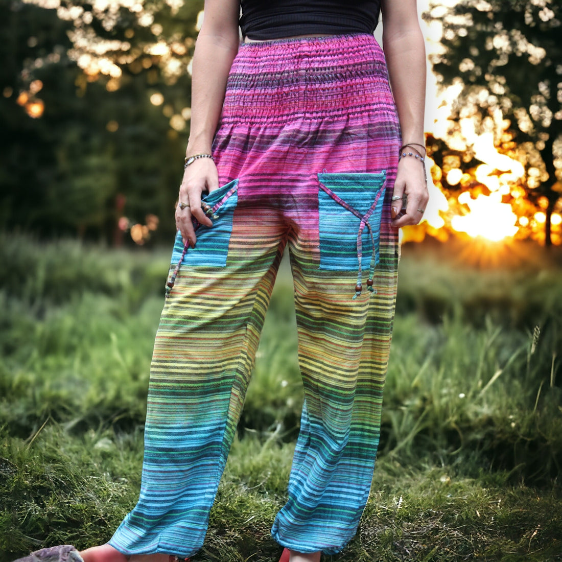 Woman basking in the glow of the sunset wearing Secret Sense Striped Cotton Harem Pants